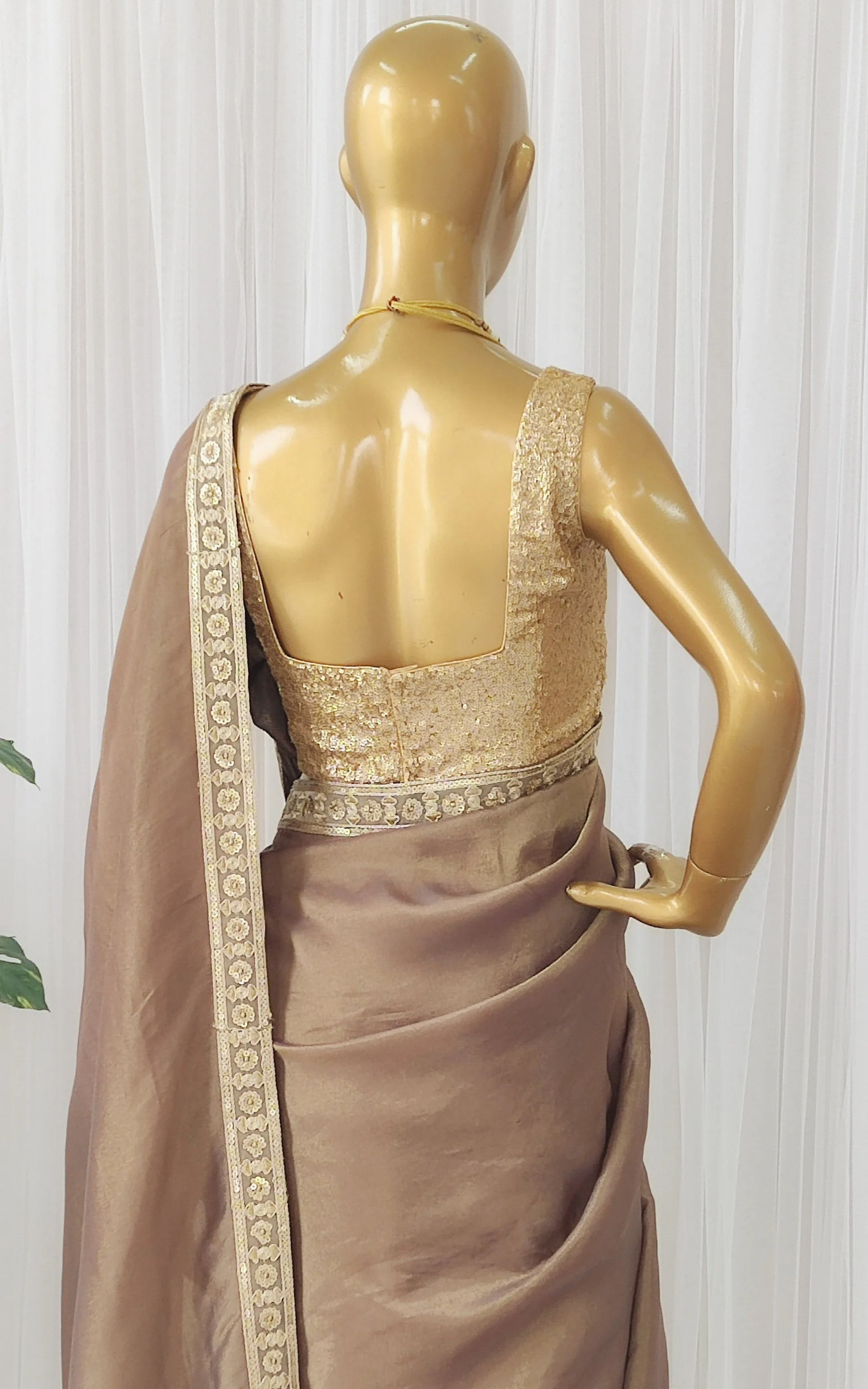 Brown Tissue Georgette Saree with Gold Sequinned Blouse