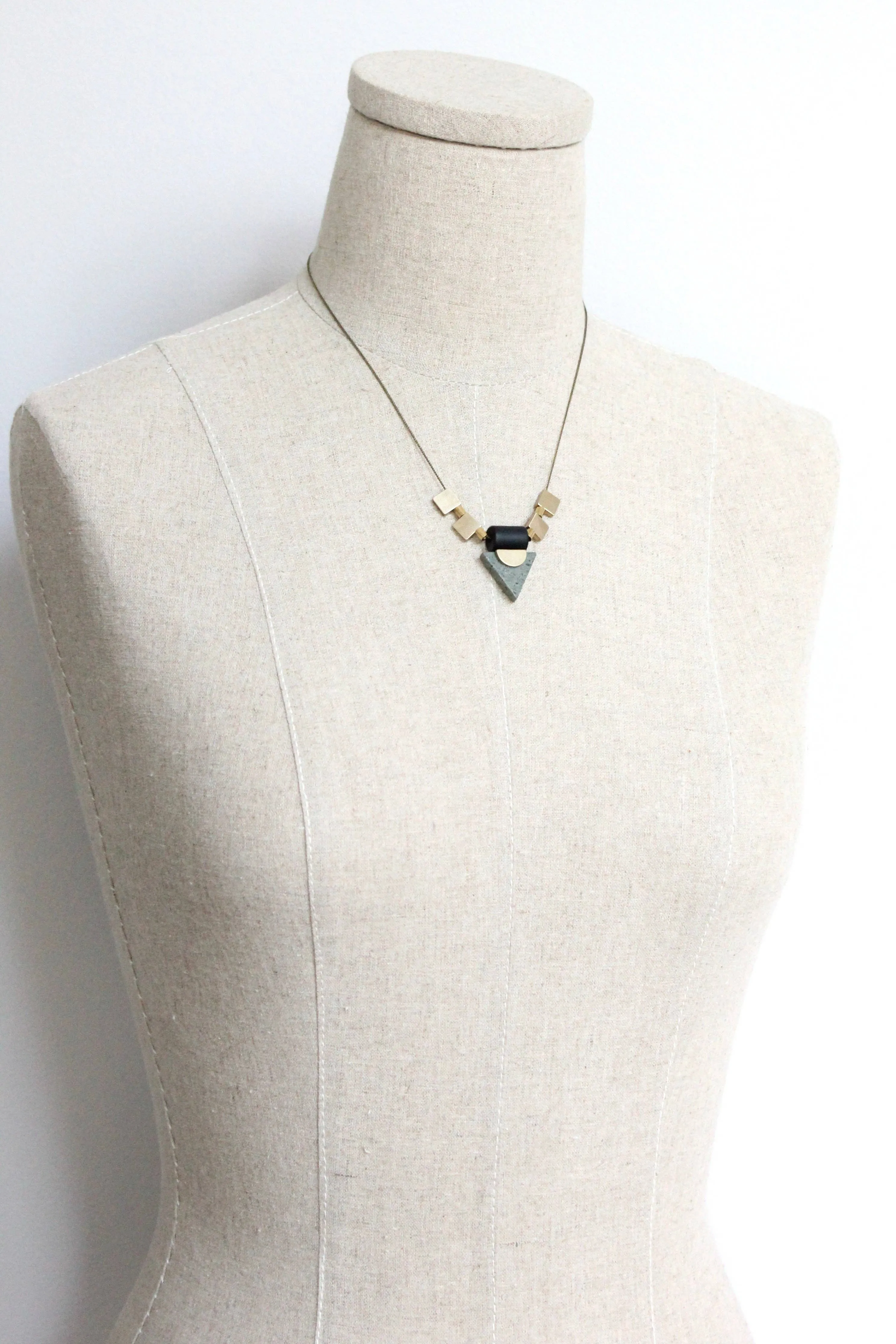 Jasper triangle and brass geometric necklace