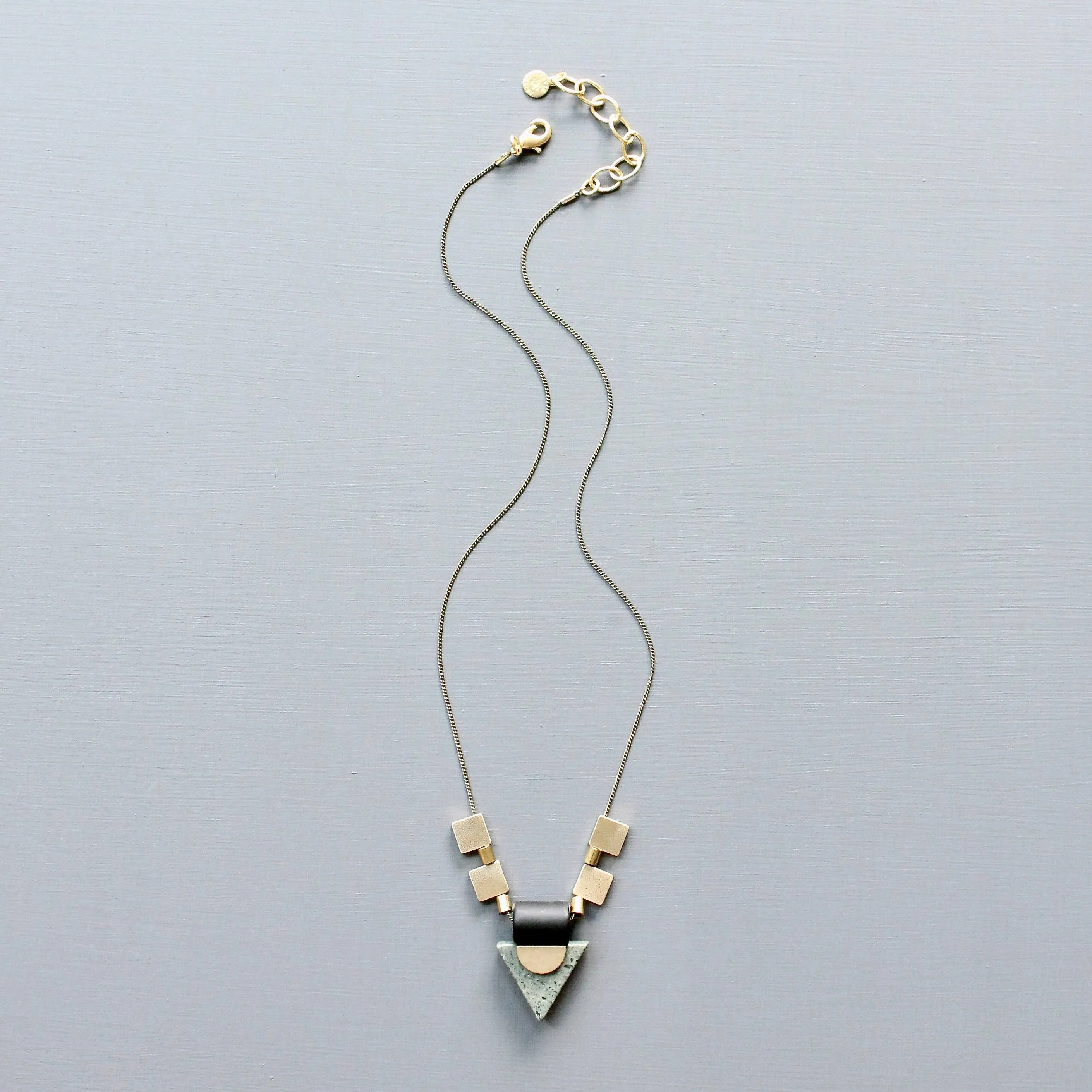 Jasper triangle and brass geometric necklace